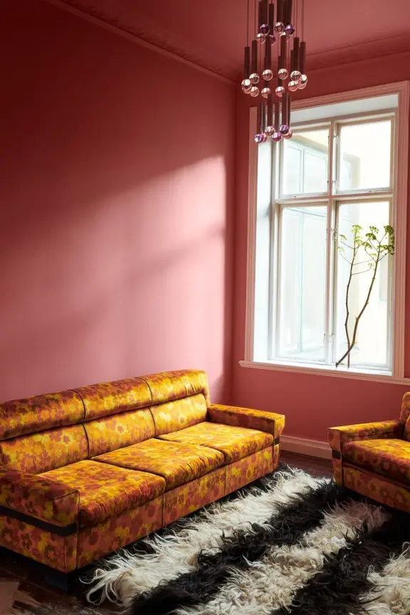 colourful living room with pink shade on walls