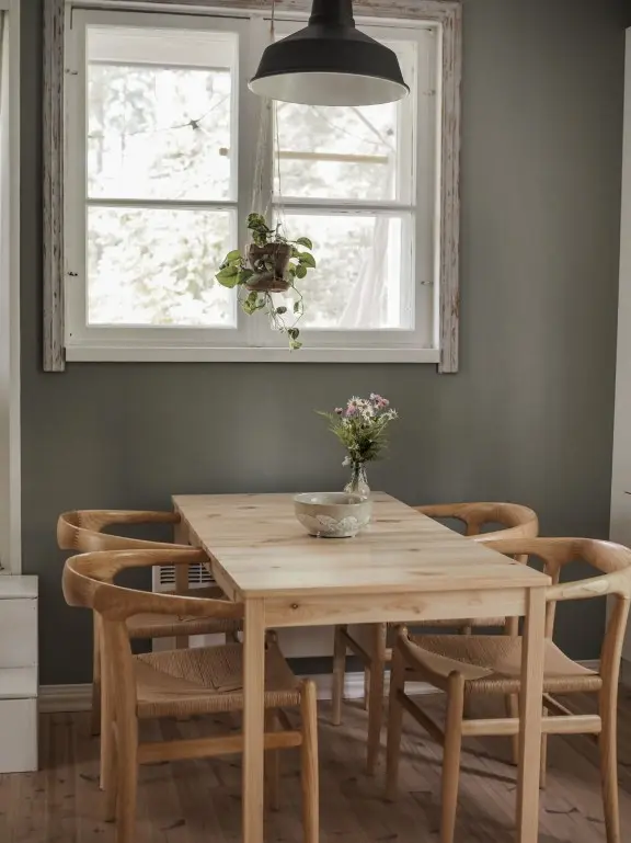 dining room with green colour wall