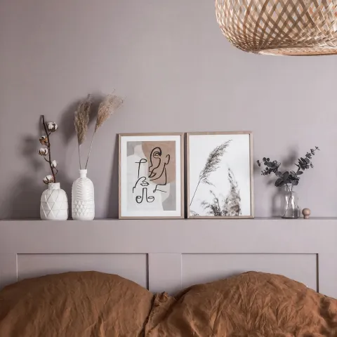 lilac colour wall and matching bed headboard