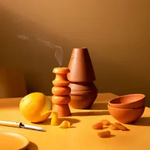 festival dinner table with warm orange yellow wall background