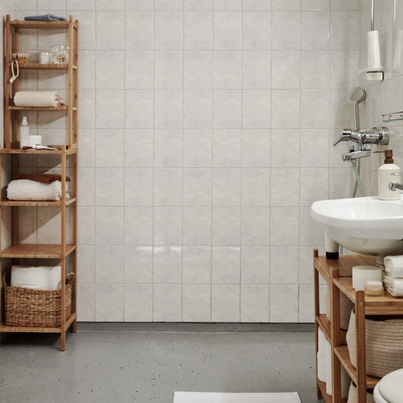 white bathroom with dated tiles