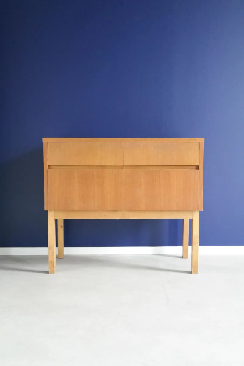 Blue bedroom with a night stand