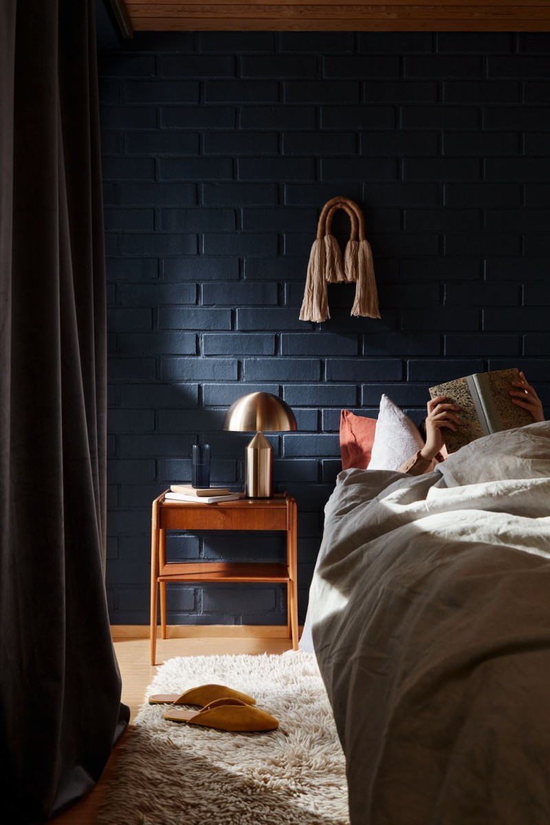 dark blue wall in bedroom 