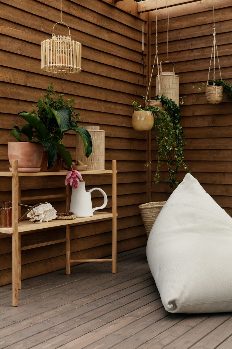 garden pergola with wooden furniture