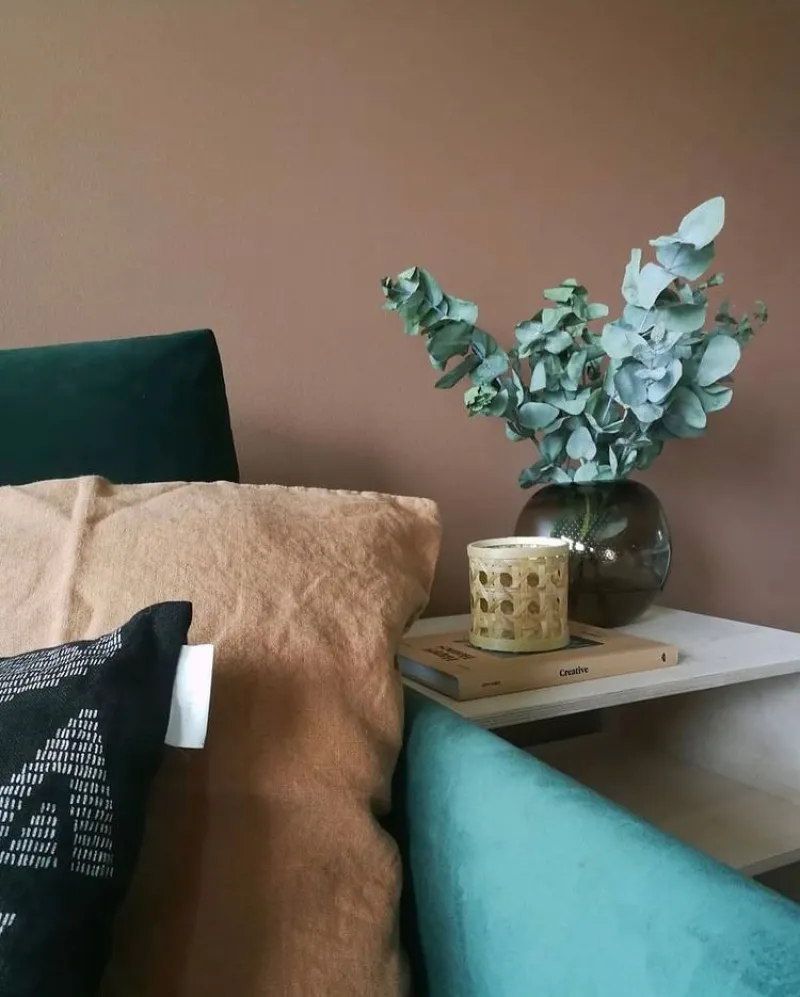 brown wall in cosy bedroom 